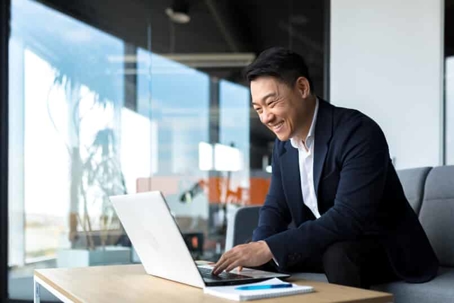 male business owner on computer