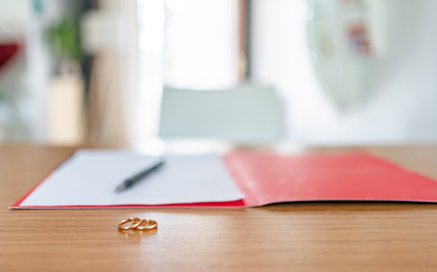 wedding rings and divorce papers